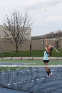 Sophomore Madison Hronek reaches for the ball 